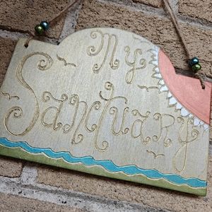 Woodburned sign. New